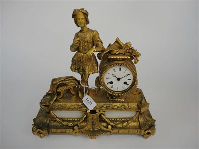 Lot 1428 - A Gilt Metal Striking Mantel Clock, circa 1890, surmounted by a gentleman in costume, swag...