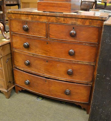 Lot 1212 - A George III mahogany bowfront four-height chest of drawers, 105cm by 53cm by 110cm