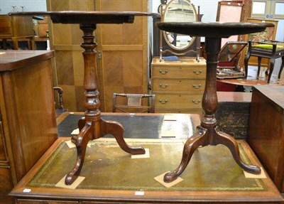 Lot 1214 - Two George III mahogany tilt-top tripod tables, largest 70cm by 52cm by 75cm, the other 52cm by...