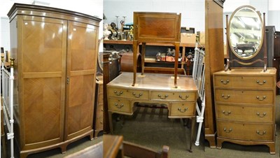 Lot 1226 - A Maple & Co bow fronted double door wardrobe 127cm by 57cm by 193cm and matching bed side...