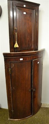 Lot 1233 - A 19th century oak and mahogany corner cupboard 76cm by 64cm by 114cm, together with a small...