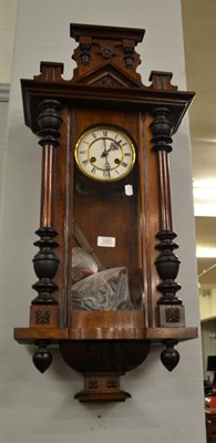 Lot 1243 - A Vienna type walnut veneered striking wall clock, circa. 1890, twin spring barrel movement...