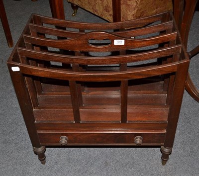 Lot 1258 - A 19th century mahogany single-drawer Canterbury on turned supports, 58cm by 37cm by 58cm