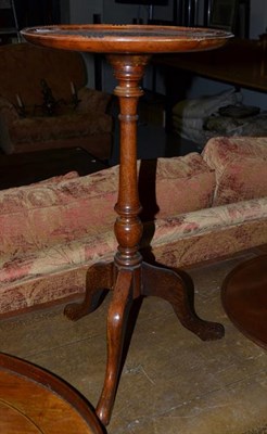Lot 1259 - A small reproduction mahogany tripod table, 40cm by 56cm by 45cm; together with a mahogany...