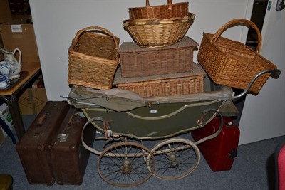 Lot 1262 - A 1920's painted and wooden-bodied pram, in need of restoration, the folding fabric covered...