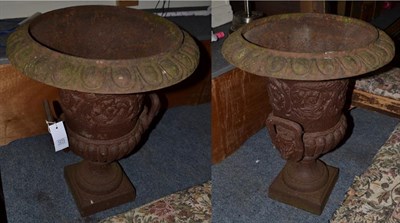 Lot 1273 - A pair of cast metal urns, 49cm diameter by 62cm high
