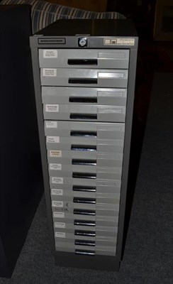 Lot 1285 - A fifteen drawer filing cabinet, 28cm by 40cm by 96cm