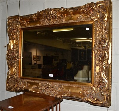 Lot 1290 - A gilt framed hall mirror, 106cm by 80cm