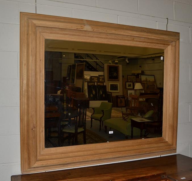 Lot 1291 - A modern oak mirror with impressive thick frame, 160cm by 130cm