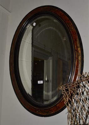 Lot 1296 - A Chinoiserie oval mirror, 91cm by 66cm