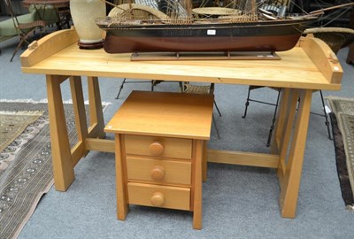 Lot 1306 - A Mark Wilkinson bespoke desk on A-line shelves, framed by a stretcher, 150cm by 70cm by 80cm,...