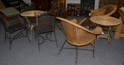 Lot 1307 - Two modern basket chairs with four similar single chairs; together with two circular tables...