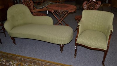 Lot 1310 - A chaise lounge upholstered in spotted green fabric, 165cm by 70cm by 84cm, and an inlaid...