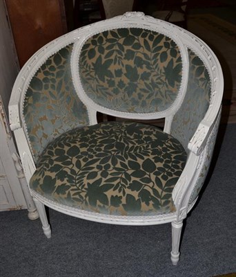 Lot 1319 - A French style painted tub armchair with teal velvet upholstery and reeded tapering supports,...