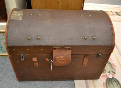 Lot 1325 - A studded canvas and leather dome topped trunk, 75cm by 48cm by 57cm