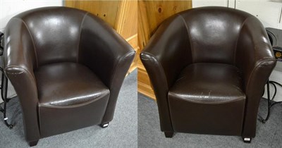 Lot 1331 - A pair of modern brown upholstered tub chairs