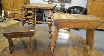 Lot 1337 - A 19th century provincial fruit wood stool and two pine examples (3)