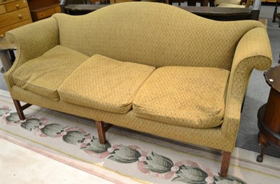 Lot 1340 - A 19th century wing back three seater sofa with scroll arms and blind fret-work carved legs, 210cm