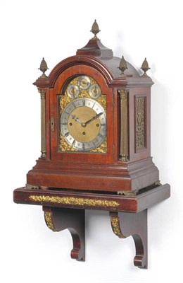 Lot 1443 - An Edwardian Mahogany Chiming Bracket Clock, with arched top and pineapple finials, Corinthian...