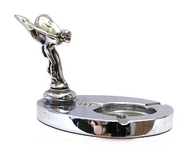 Lot 18 - Rolls-Royce: A Chrome-Plated Ashtray, modelled as the Spirit of Ecstasy, mounted on an oval...