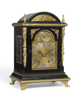 Lot 1444 - An Ebonised and Gilt Metal Mounted Quarter Striking Table Clock, circa 1890, the arched top...