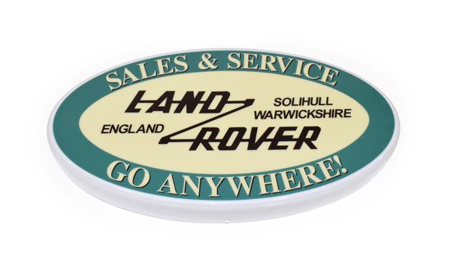 Lot 35 - An Illuminated Car Display Sign: Land Rover Sales and Service Go Anywhere!, with low voltage...