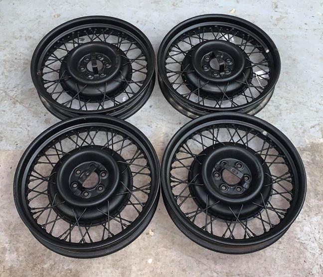Lot 51 - ~ Four Pre-War 19'' Wire Wheels, sand-blasted and repainted black