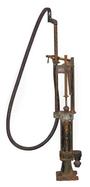 Lot 58 - Wayne: A 1920/30 Brass Skeleton Petrol Pump, with rubber hose and brass filling tape, bearing brass
