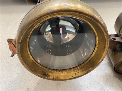 Lot 66 - A Powell & Hanmer Veteran Copper and Brass Self-Contained Acetylene Head Lamp, with 7'' lens,...