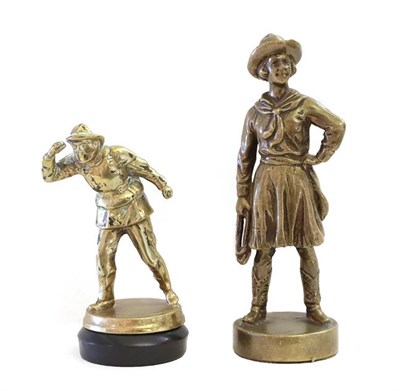 Lot 131 - A Solid Brass Car Accessory Mascot, as a lifeboatman, mounted on a plastic base, 10.5cm high; and A