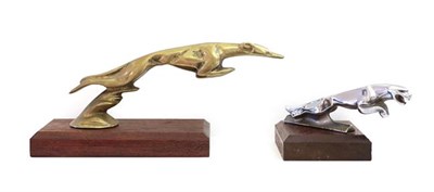 Lot 147 - An Art Deco Style Brass Car Mascot, as a stylised greyhound with body outstretched, standing on...