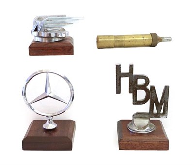 Lot 151 - A 1930's Chrome Car Mascot from a Wolseley, mounted on a wooden base, 7cm high; A Mercedes...