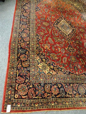 Lot 1480 - Kashan Carpet  Central Persia The strawberry field of leafy scrolling vines centre by an indigo and