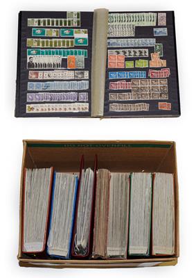 Lot 2029 - Carton containing 7 volumes incl. 5 large Lighthouse stockbooks  with 10s of 1000s of stamps mainly