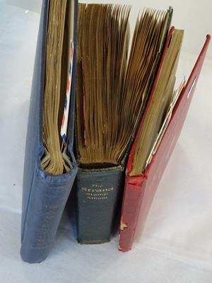 Lot 2039 - Worldwide collection in 3 albums, including a vintage Strand album well-filled with approx....