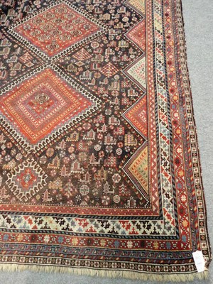 Lot 1492 - Kashgai Rug  South West Persia The field with a single column of latch hook medallions...