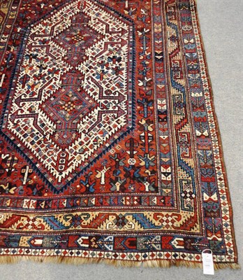 Lot 1496 - Shiraz Tribal Rug  South West Persia The ivory serrated lozenge field with two stepped indigo...