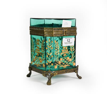 Lot 12 - A Gilt-Metal Mounted Green Glass Casket, of octagonal section and on four paw feet, the glass...
