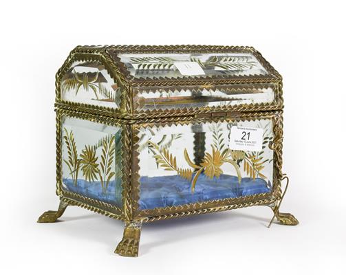 Lot 21 - A Brass-Mounted Glass Casket, Possibly French, oblong and on paw feet, with twisted wire...