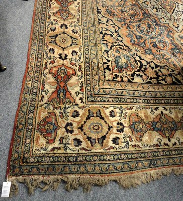 Lot 1510 - Large Khorasan Carpet North East Persia The rust field of scrolling vines around an ice blue floral