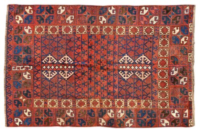 Lot 1511 - Unusual Kirghiz Ensi Pamir Region The madder quartered field of hooked motifs enclosed by...