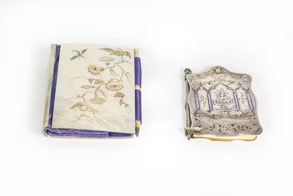 Lot 56 - A Victorian Silver and Enamel Aide Memoire and a Victorian Mother-of-pearl Aide Memoire, the...