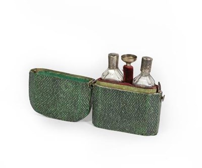 Lot 61 - A Cased Pair of George III Silver-Mounted Glass Scent-Bottles, the glass tapering and with...