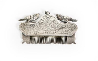 Lot 79 - A White Metal Moustache Comb, Possibly Indian, with two exotic bird finials, with compartment...