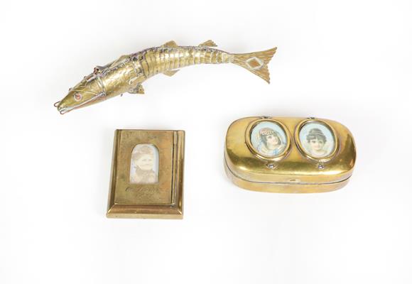 Lot 80 - Two brass or brass finish snuff-boxes and an articulated fish ornament, the snuff-boxes each...