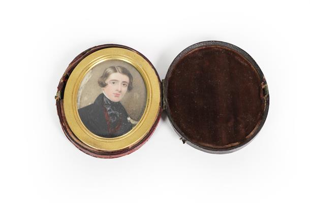 Lot 83 - Continental School, an oval portrait miniature on ivory of a young gentleman in black coat, in...