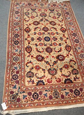 Lot 1515 - Pair of Kashan Rugs Central Persia Each with a cream field of palmettes and vines enclosed by...