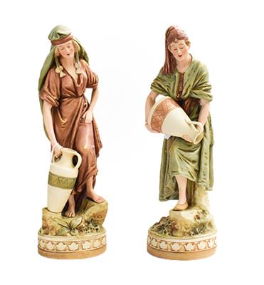 Lot 114 - A pair of Royal Dux figures, stamped 1072 and 1073