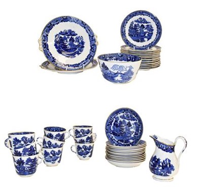 Lot 120 - A collection of Victorian blue and white Willow pattern teawares, twelve settings, gilt...