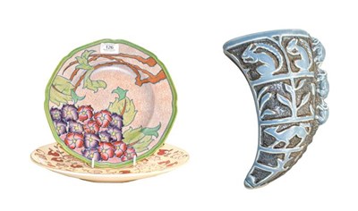 Lot 126 - A Crown Ducal plate by Charlotte Rhead, a Crown Ducal charger and a Burleigh ware wall pocket (3)